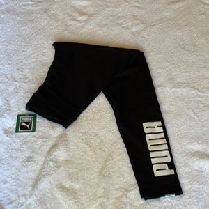 Puma athletic wear. Size M.  Black/white.  Never worn. With tags